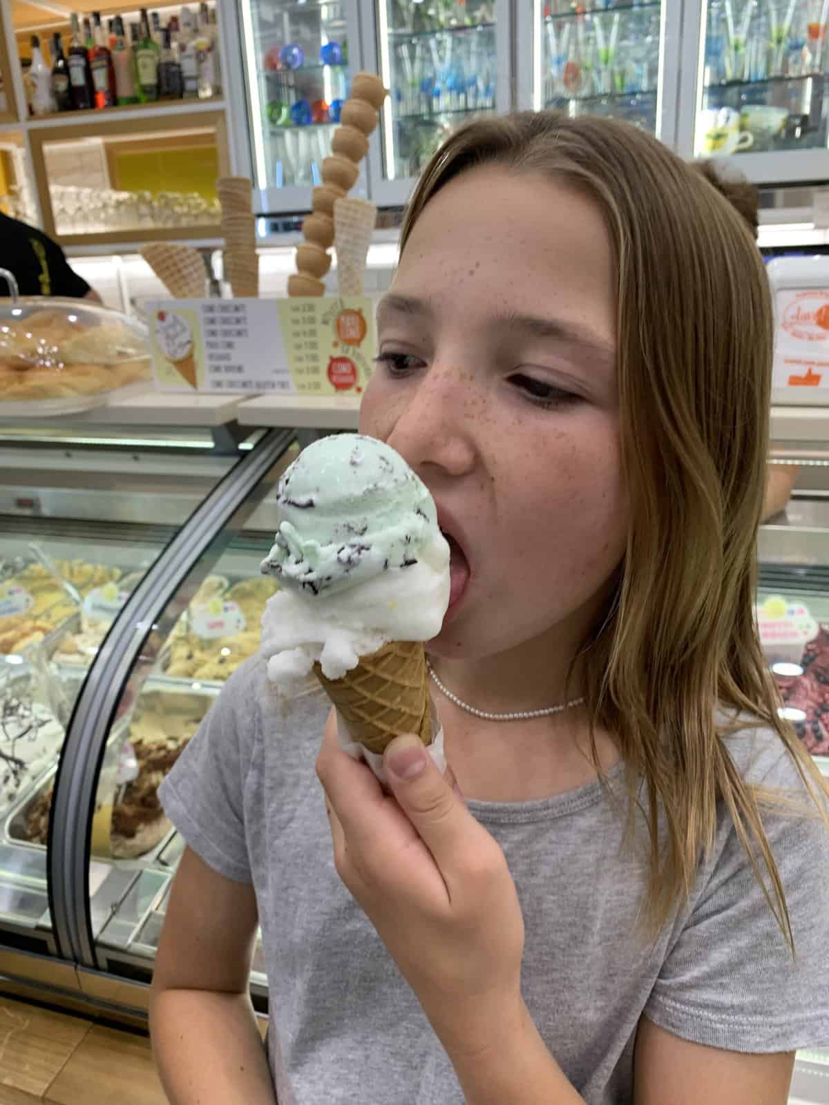 Miss E eating gluten-free gelato in a gluten-free cone