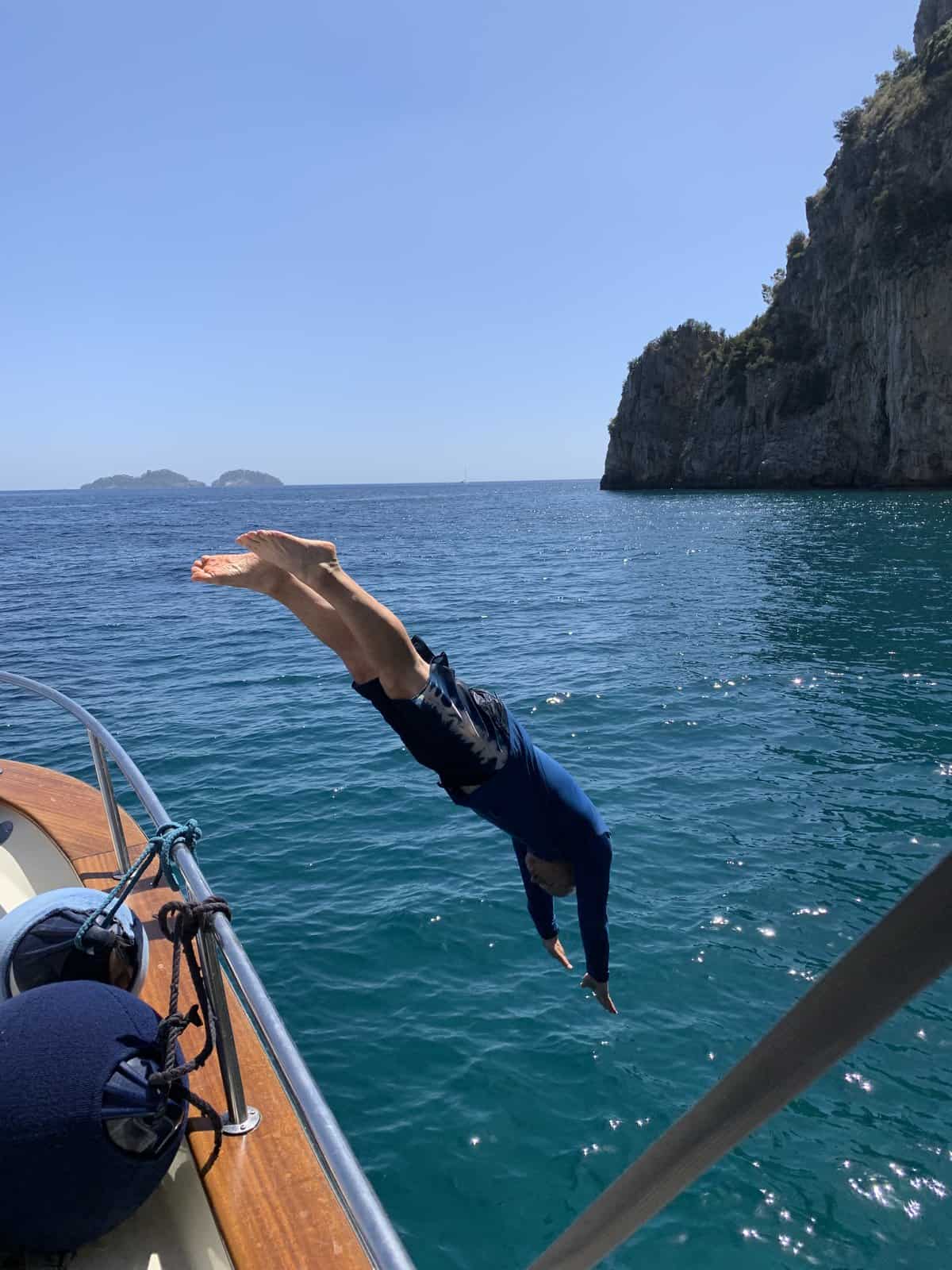 Dave jumping off the boat into the sea