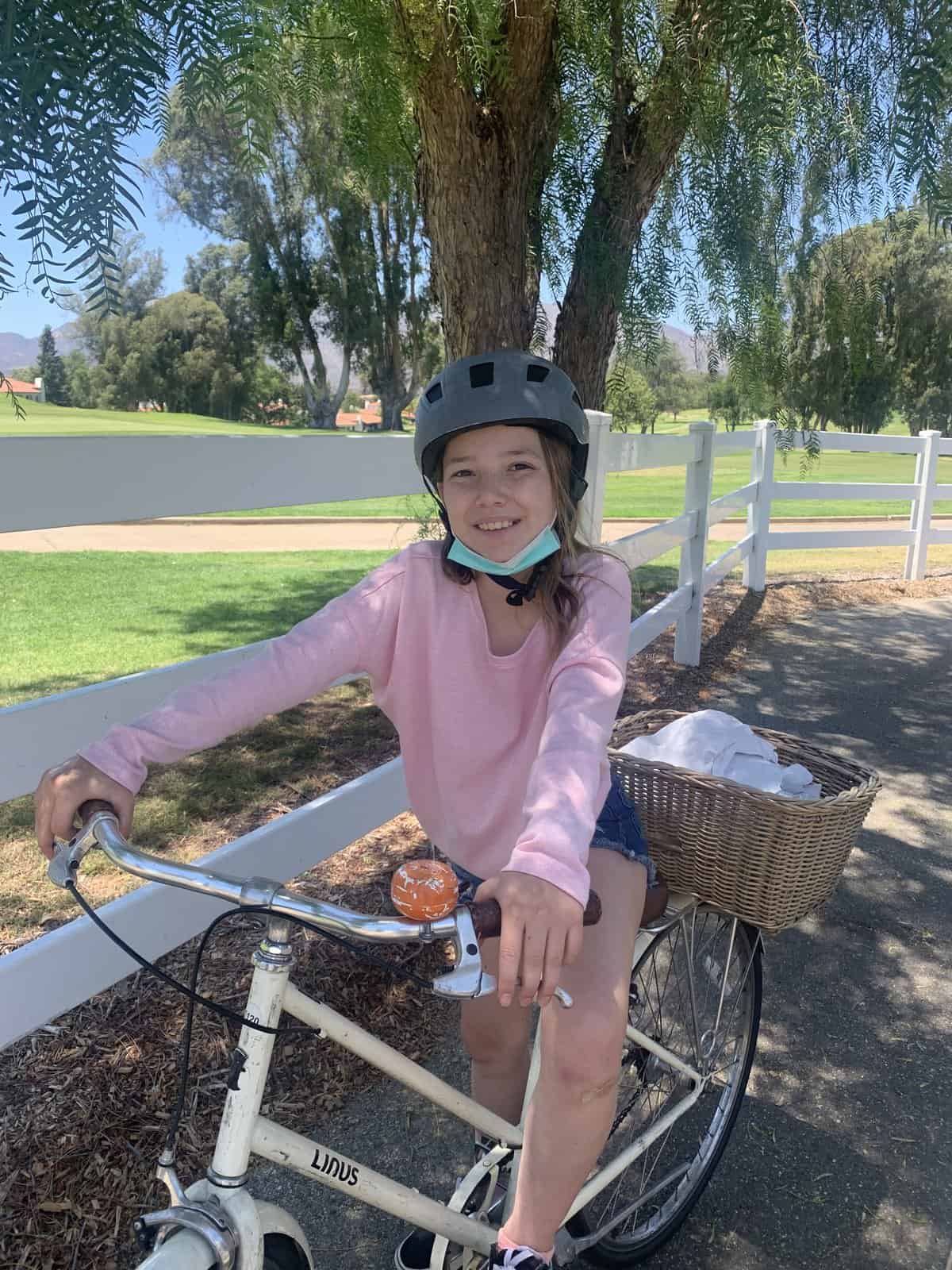 Miss-E on a bike with a gluten-free picnic from the Ojai Valley Inn