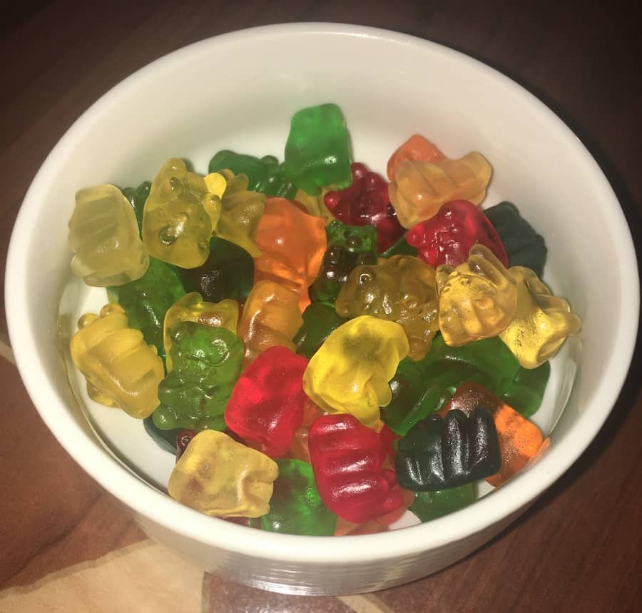 white bowl of multi-colored gummy bears