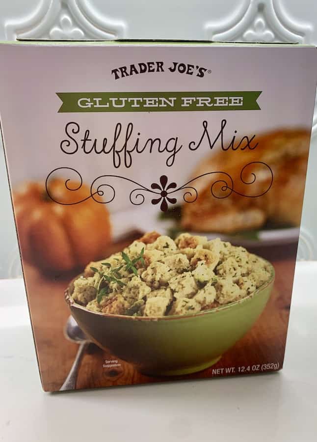 a box of "Trader Joe's Gluten Free Stuffing Mix" with a green bowl full of stuffing on the cover of the box