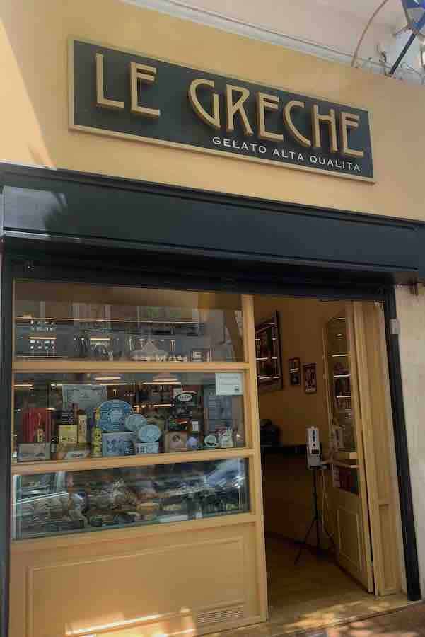 Gelateria with a sign above "Le Greche"