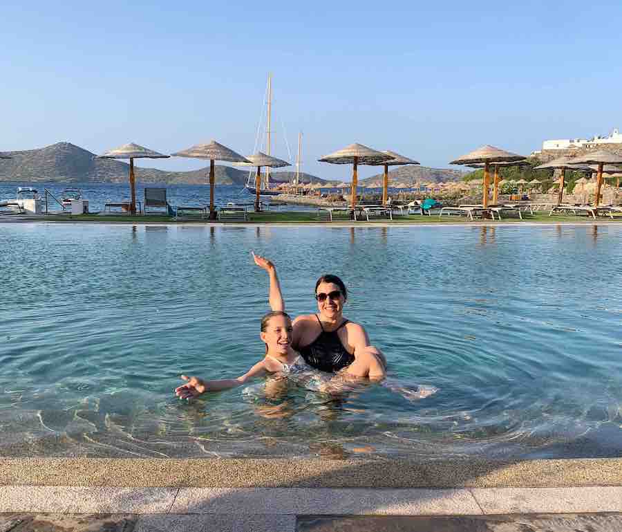 Miss E & Heather at the Porto Elounda Golf & Spa Resort pool