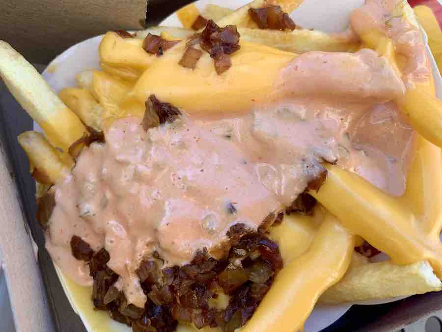 gluten-free animal-style fries from In-N-Out (fries, topped with melted cheese, grilled onions, and spread)