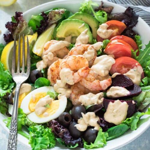 gluten-free salad with shrimp, eggs, avocados, tomatoes, lettuce