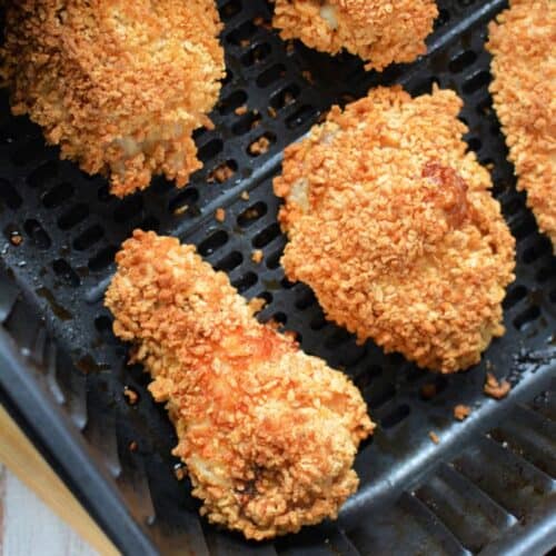 gluten-free breaded chicken wings on a baking pan