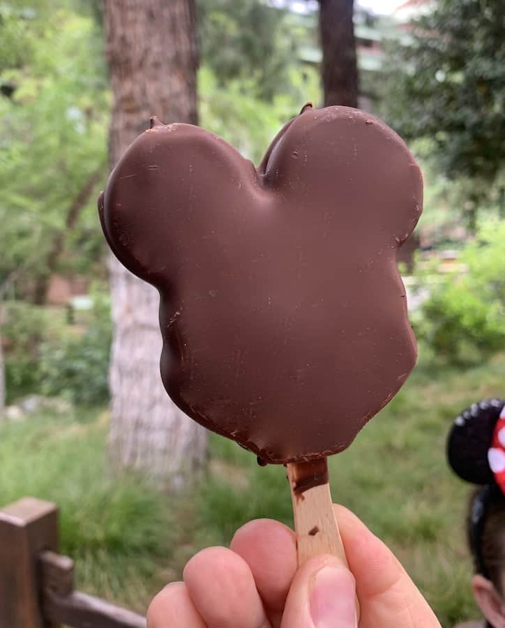 gluten-free Mickey Mouse ice cream bar with a bite out of the ear