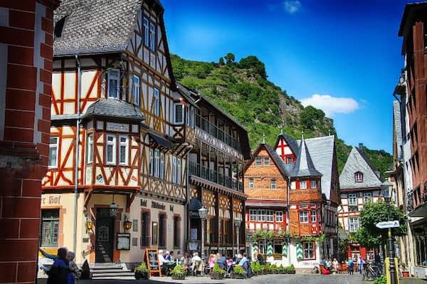 a German village with shops and a restaurant along a walking street