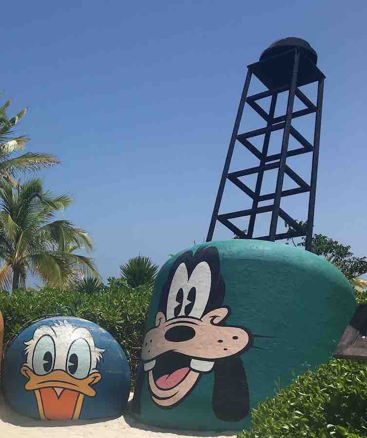 Donald and Goofy painted onto cement decor at Castaway Cay