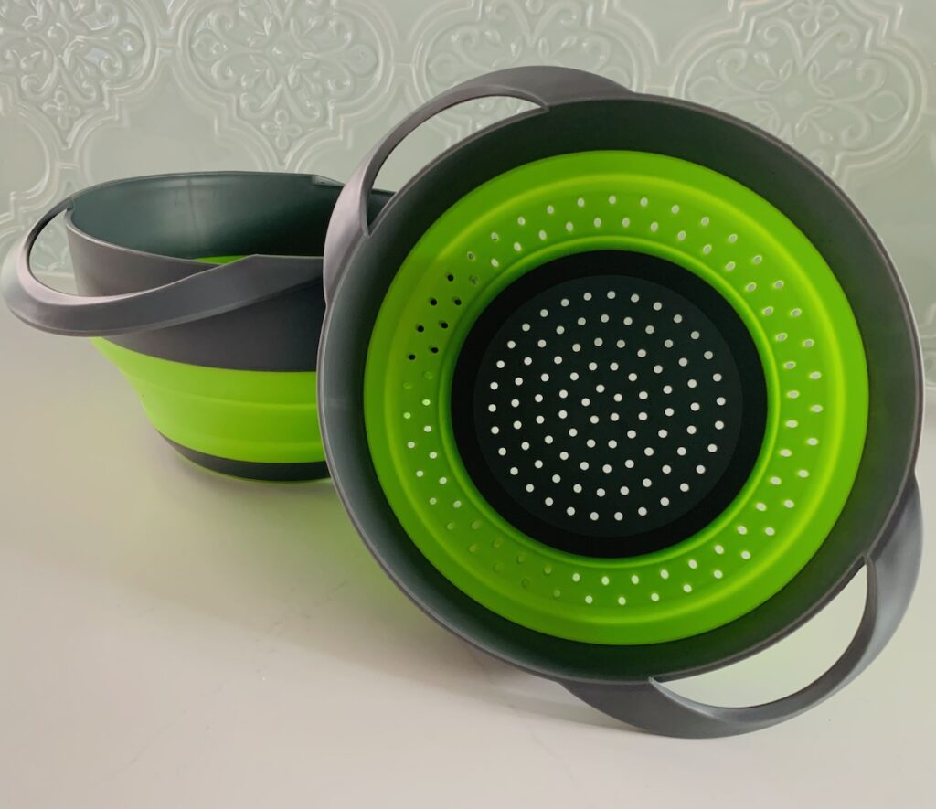 Green & grey collapsible colander and bowl.