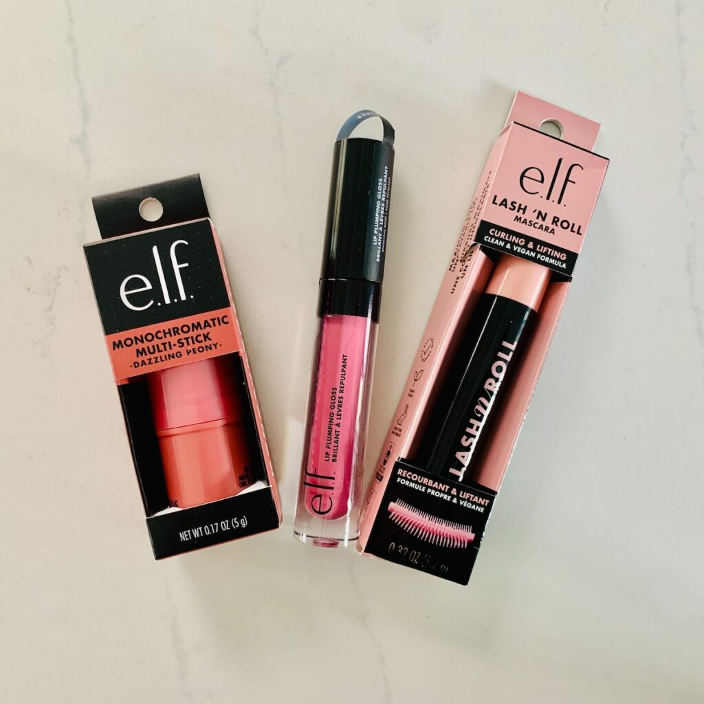 Pink elf brand makeup: mulitstick, lipgloss, and lash n roll.