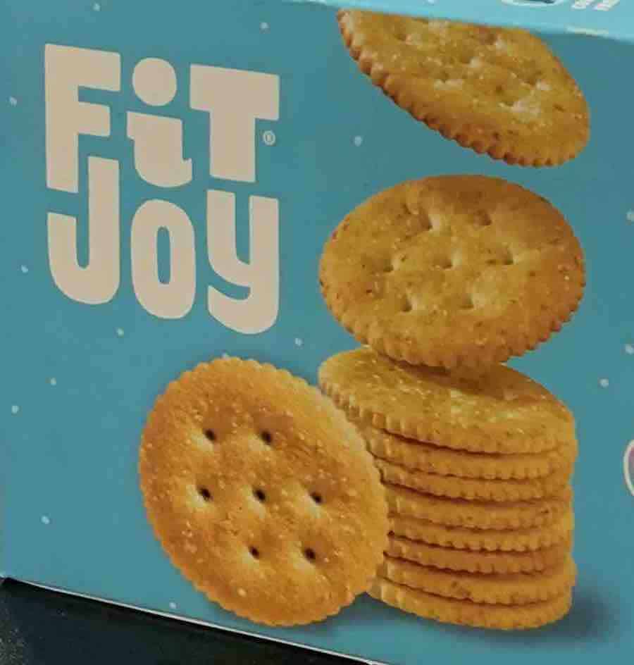part of Package of gluten-free fit joy crackers (look like Ritz crackers), with white text "Fit Joy" and an image of the crackers