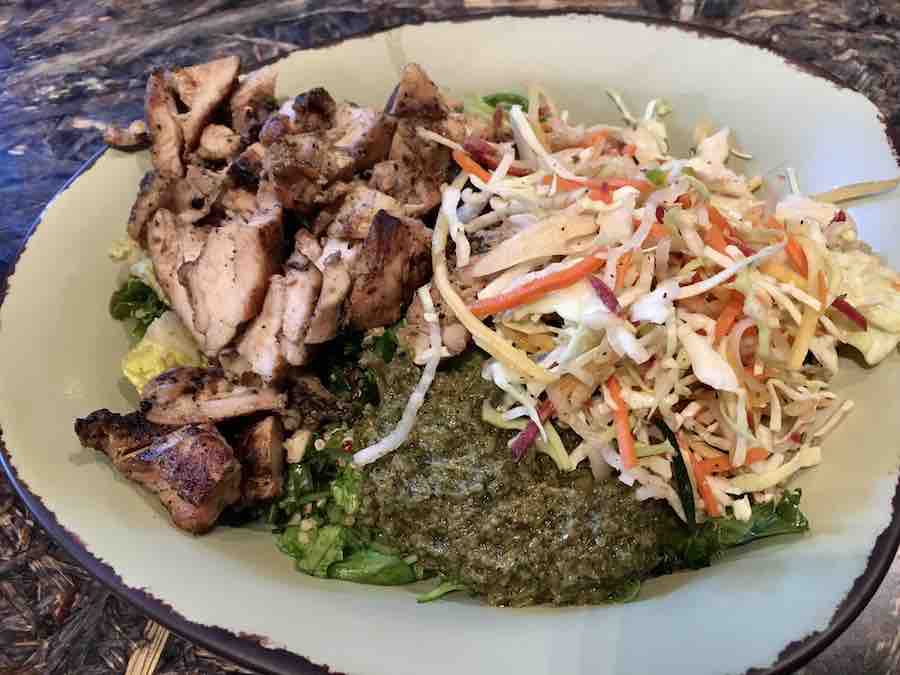 a gluten-free bowl from spatula canteen with protein, sauce and cabbage