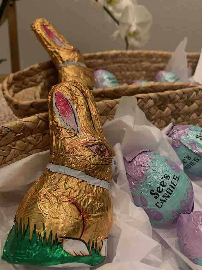 gluten-free chocolate Easter bunnies and See's Candies' chocolate eggs in two easter baskets