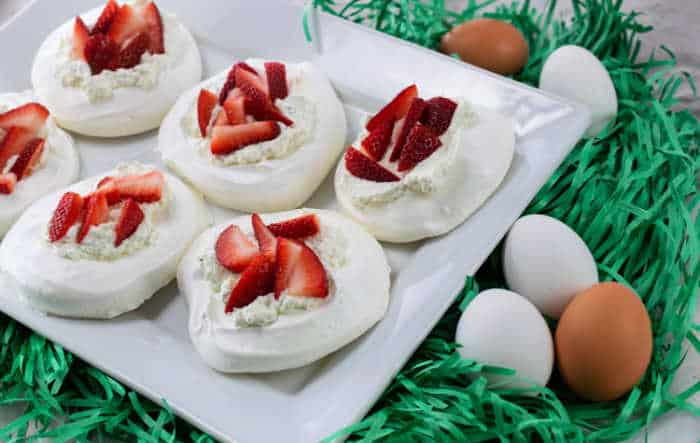 Easter Meringue Nests filled with strawberry slices