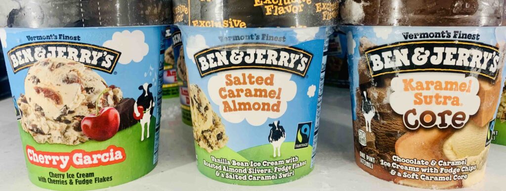 3 pints of Ben & Jerry's ice cream lined up: Cherry Garcia, Salted Caramel Almen and Caramel Sutra Core