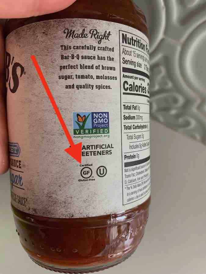 side of barbecue sauce jar with a red arrow pointing to the gluten-free certification logo