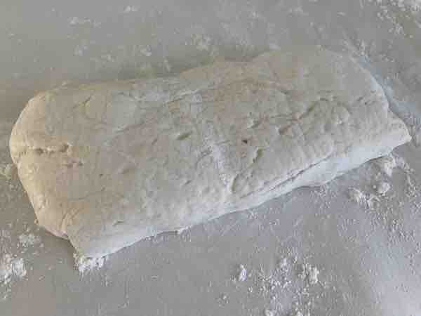 gluten-free dough shaped into an 8" log