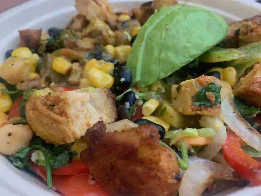 Green Tomato grill gluten-free Baja bowl: avocado, chicken, corn, beans, cheese, rice