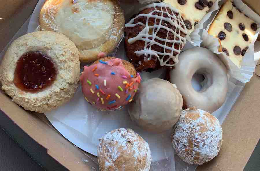 Twiced Baked Bakeries gluten-free donuts, apple fritter, and donut holes