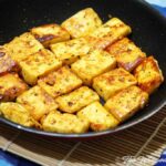 fried cheese squares in a pan
