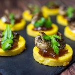 polenta circles topped with onion, mushroom and parsley