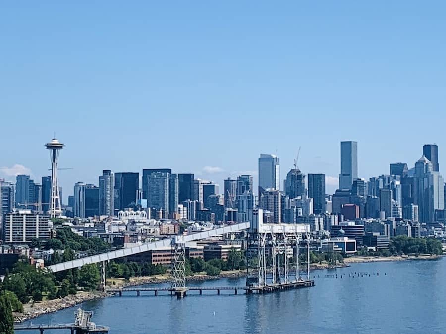 view of the Seattle skyline from the water, Space Needle is visible and high rise buildings