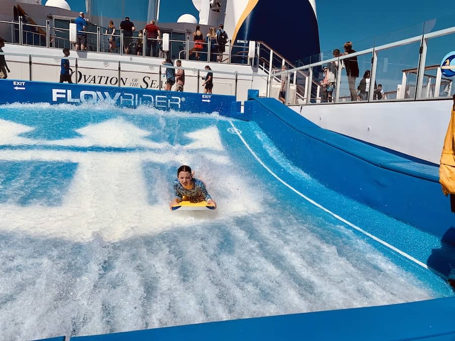 Miss E boogie boarding on the Flowrider's manmade waves