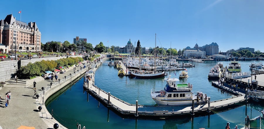 Victoria Harbor with Empress Hotel and Parliament Building visible in the background, waterfront and boats 