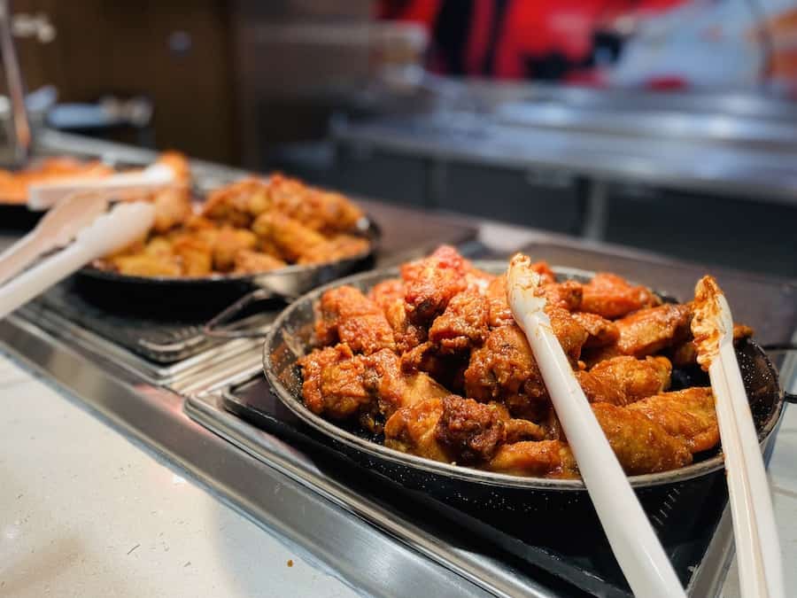 gluten-free chicken wings on a buffet line