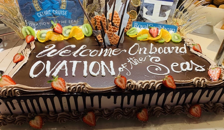 Welcome Aboard Cake, chocolate frosting with text: Welcome Aboard Ovation of the Seas