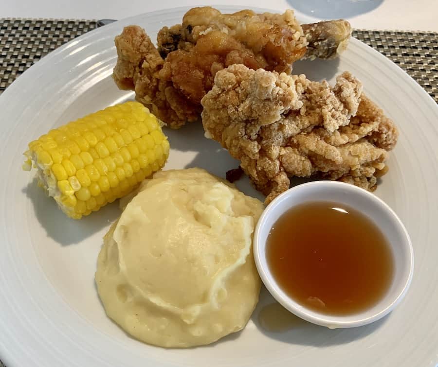 fried chicken with mashed potatoes, corn and honey
