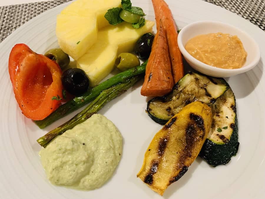 fruit and veggie platter: grilled zucchini and squash, carrots, asparagus, pineapple, olives
