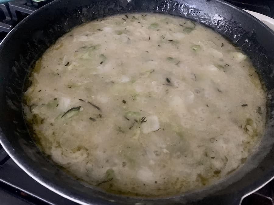 bubbling sauce in a skillet