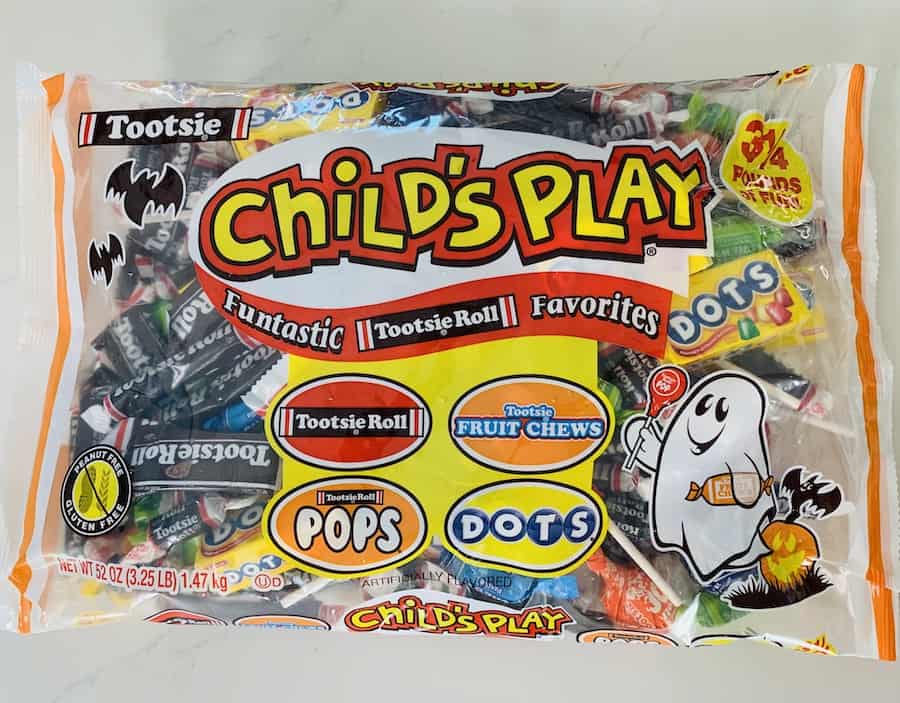 Bag of Child's Play Candy assortment: Tootsie Rolls, DOGS, Tootsie Pops, and Tootsie Fruit Chews.