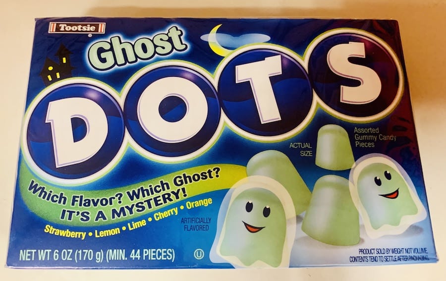 A box of Halloween Ghost Dots where the candy looks like glowing white/green ghost shapes.