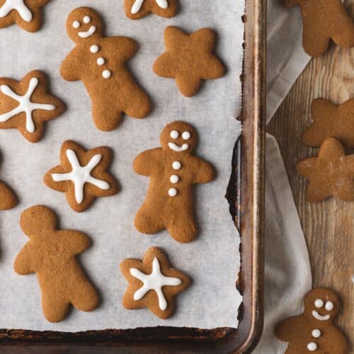 Bird's eye view: tray of gingerbread men and star gingerbread cookies.