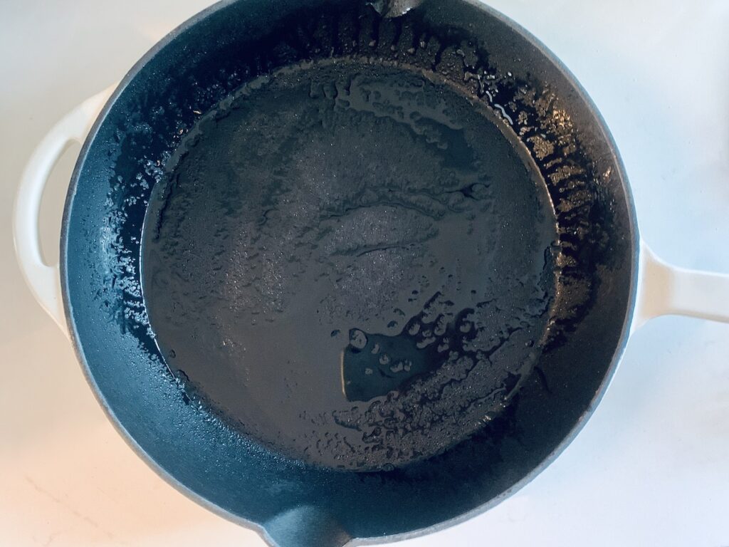 Bird's eye view: a greased cast-iron pan.