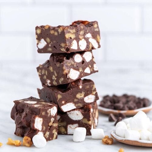 Stack of rocky road fudge squares.