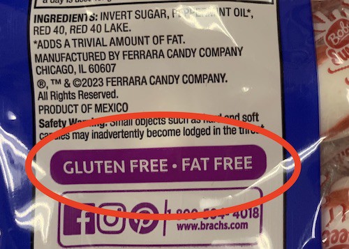 Words "gluten-free - fat-free" circle in red on a bag of Brach's Ferrara Company candy.