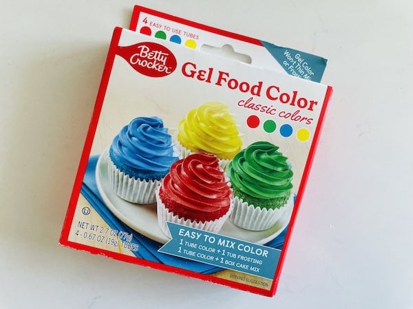 Box of Betty Crocker Gel Food Color with a photo of four cupcakes with four different colors of frosting (bright red, blue, yellow & green) on the front.