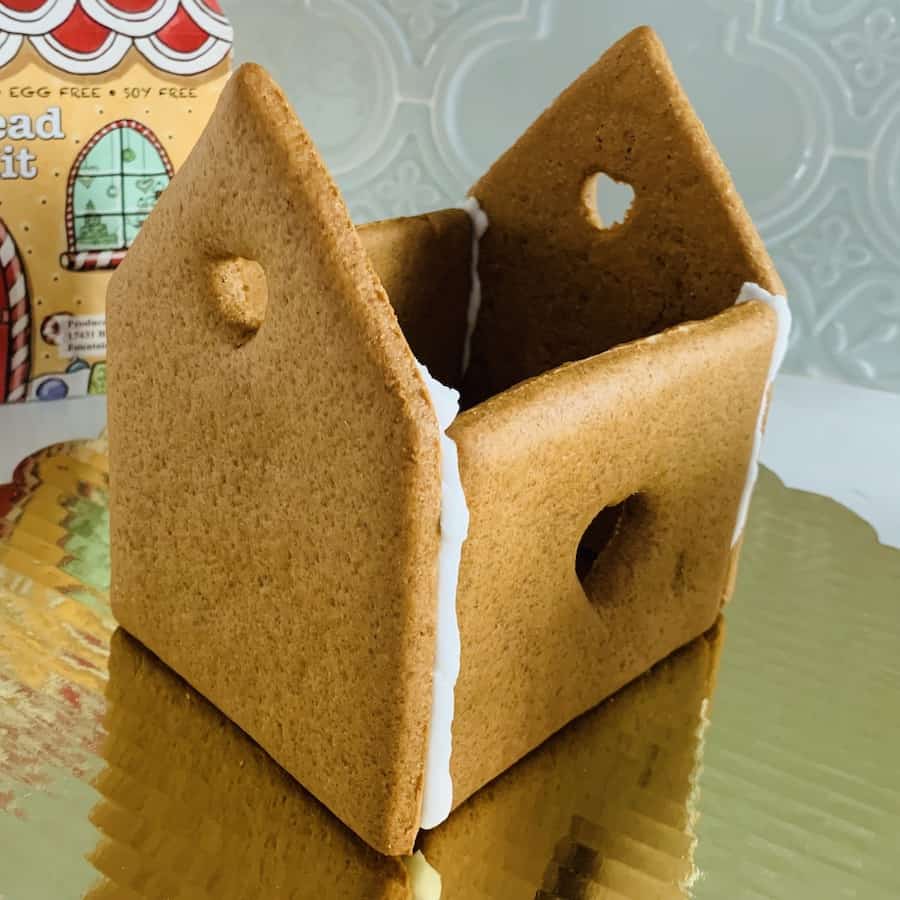 Four walls of a gingerbread house drying.