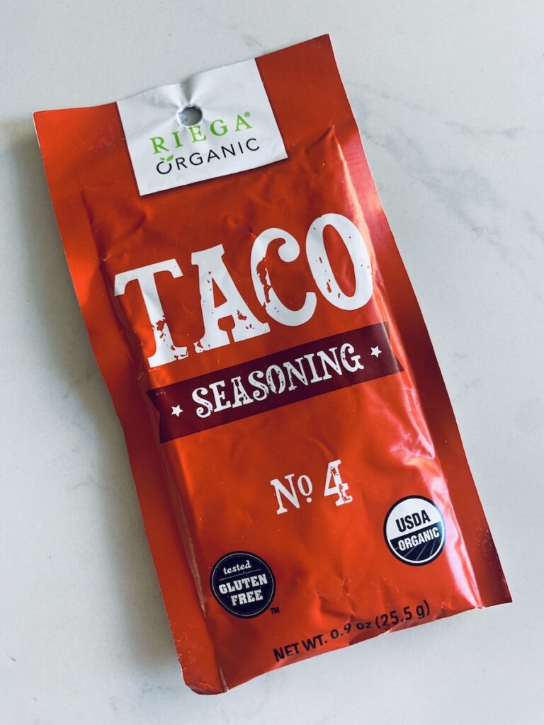 Red package of Riega Organic taco Seasoning with a gluten-free claim in a black circle on the bottom left of the package.