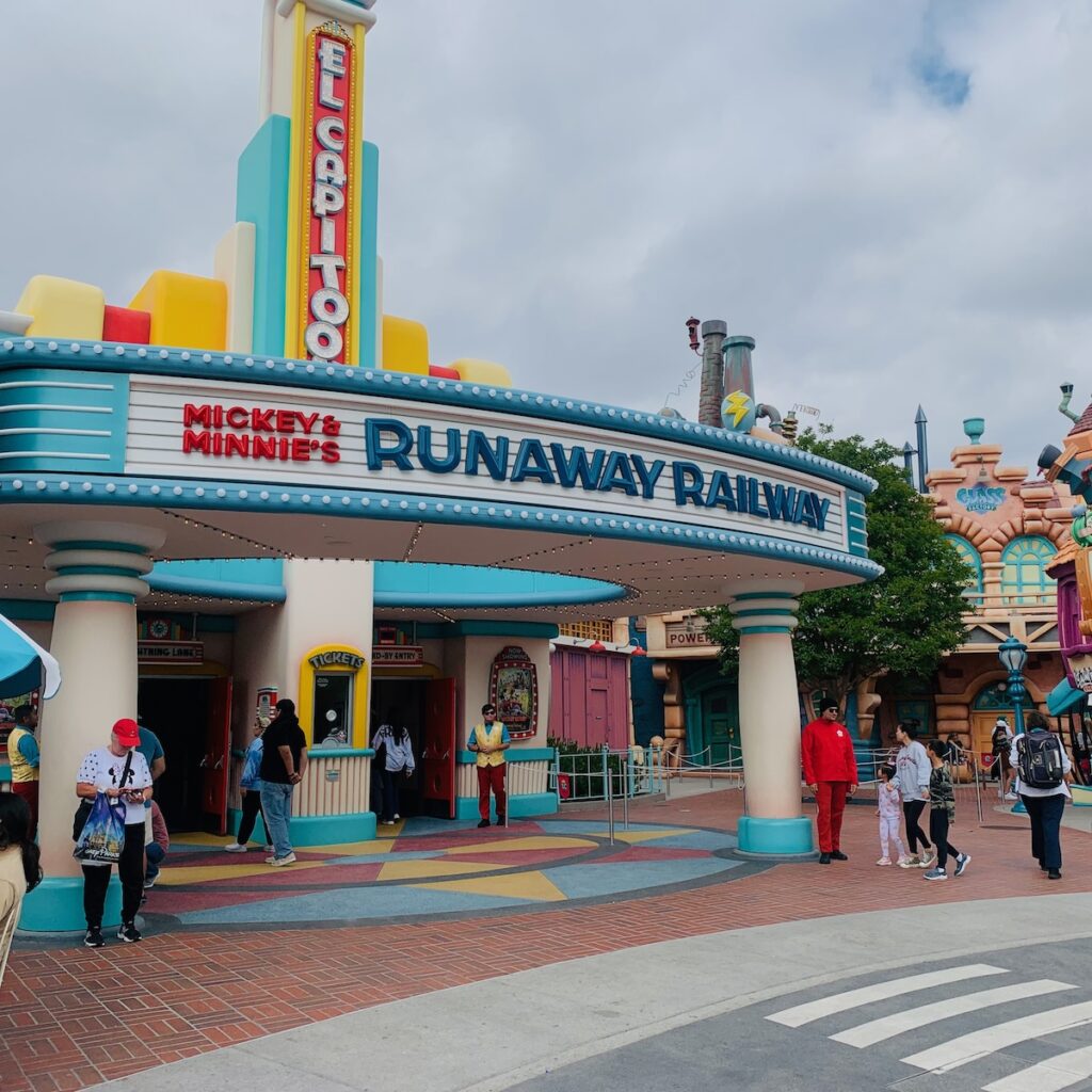 Exterior of Mickey's Runaway Railway Ride looks like cartoonish movie theater.